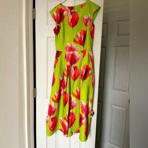 Green dress with print tulips. Size Medium